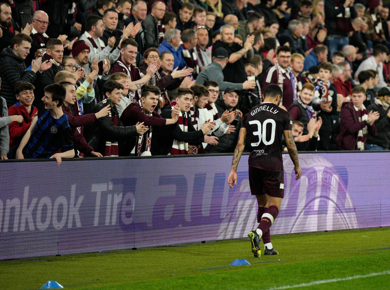 Josh Ginnelly applauded by the Hearts fans